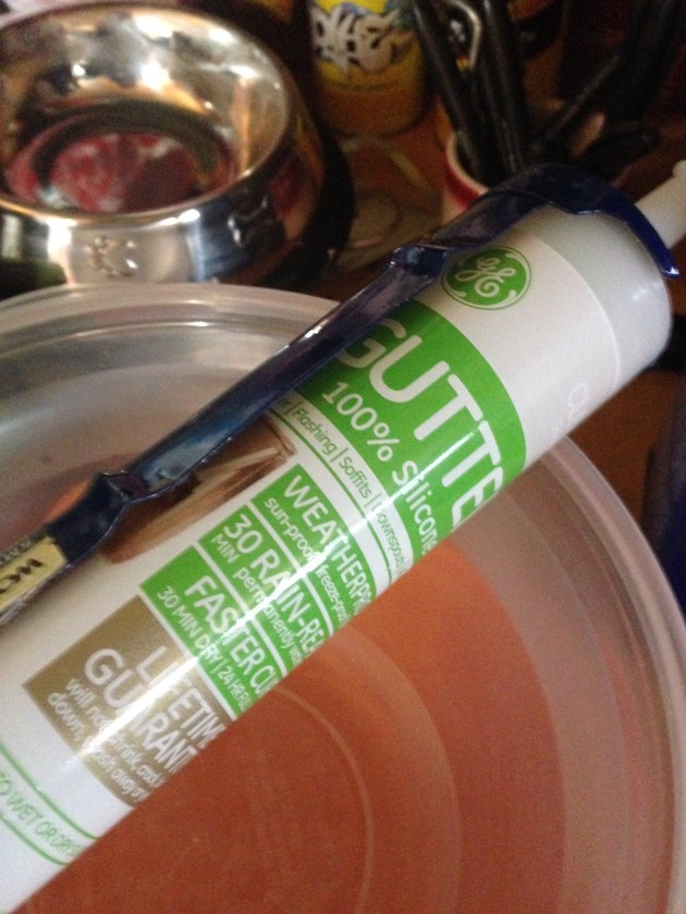 100% Clear Silicone. Use 1/2 tube per quart of mineral spirits.